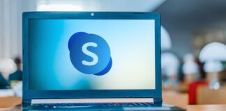Laptop Computer Displaying Logo Of Skype For Business Server